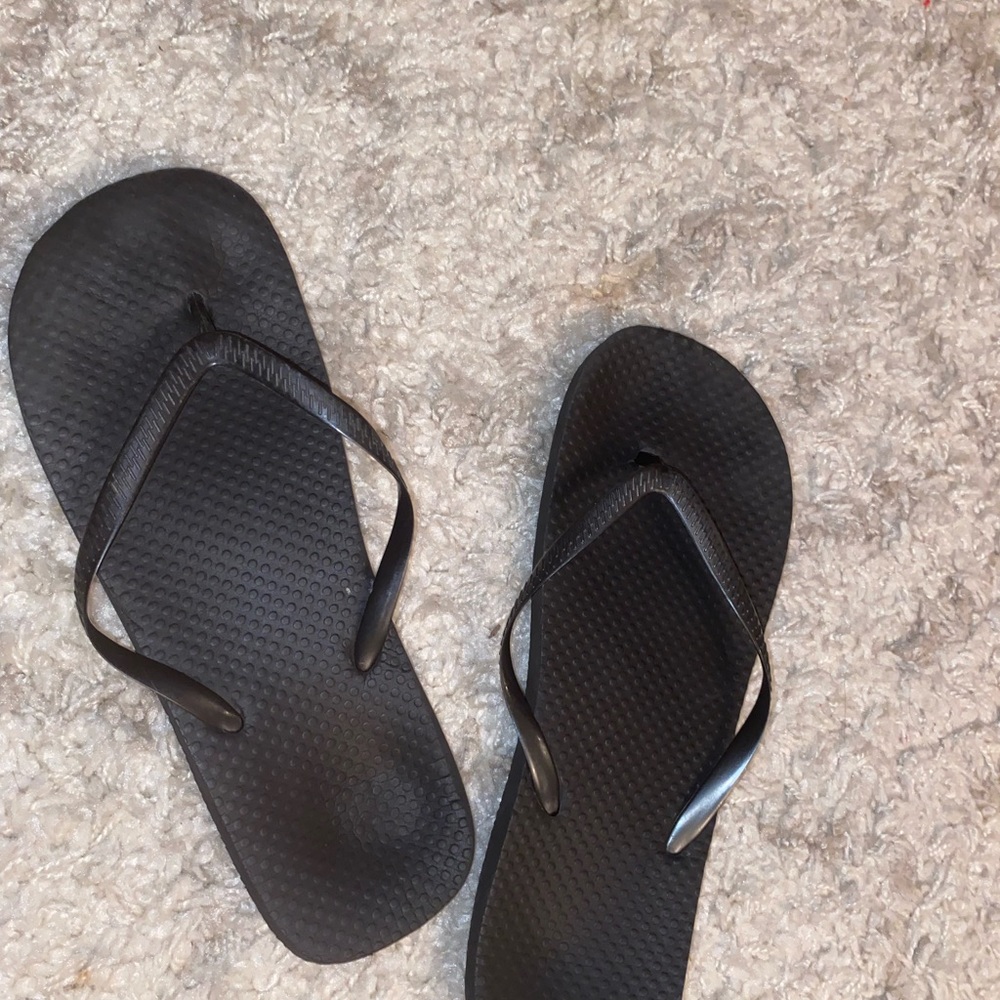 Rubber worn flip flops